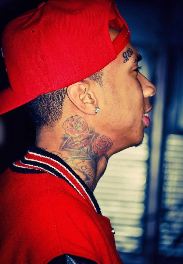 Rose tattoos on the neck for men