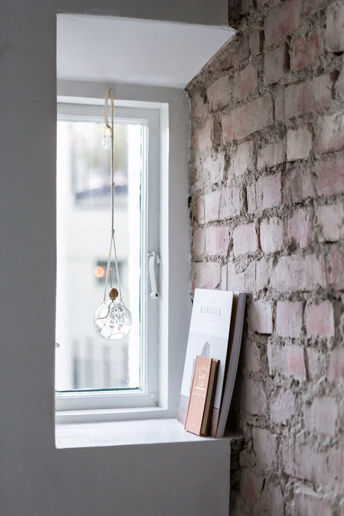 unfinished brick wall small window