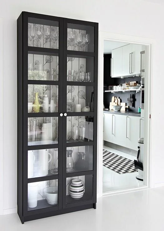 Decorate black cabinet with wallpaper