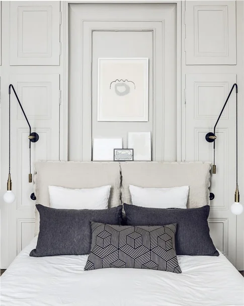 White bed matching with dark pillow