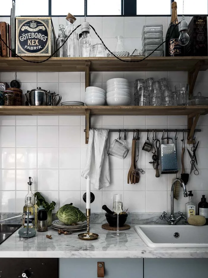 open wood shelves kitchen with marble count top