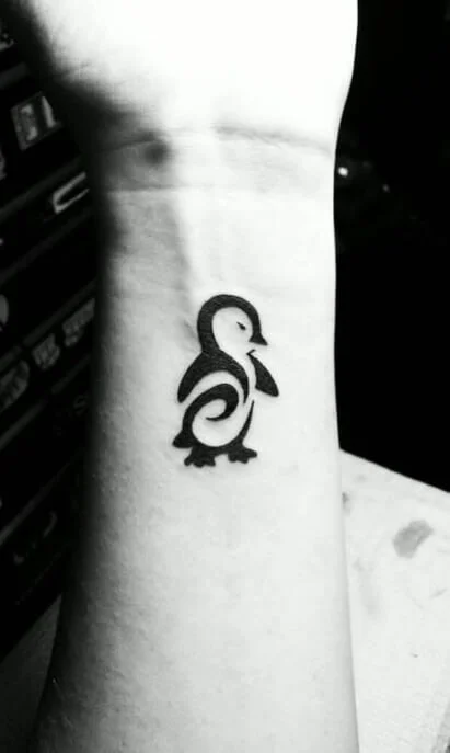 Cute Graphic Penguin Tattoo