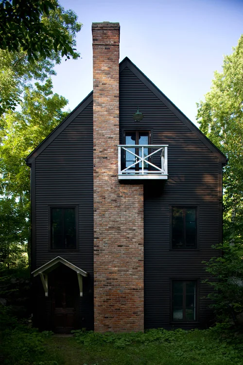 Black Exterior and Brick Pillar