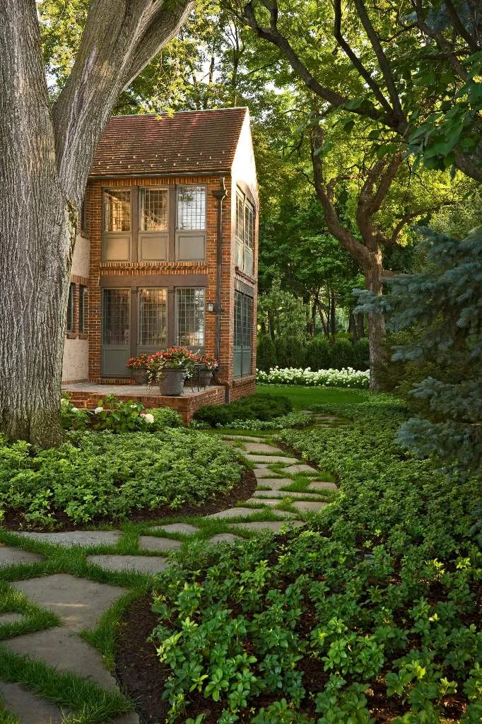 Living Room Extension with Stone on Grass Pathway