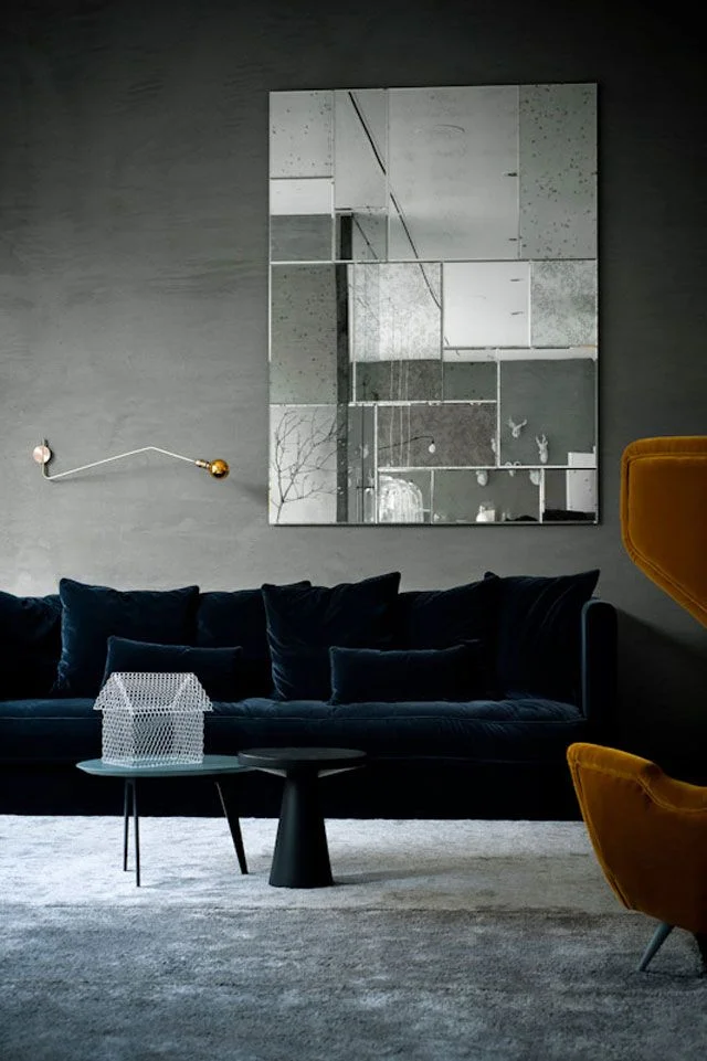 Midnight Dark Blue Sofa and Grey Carpet