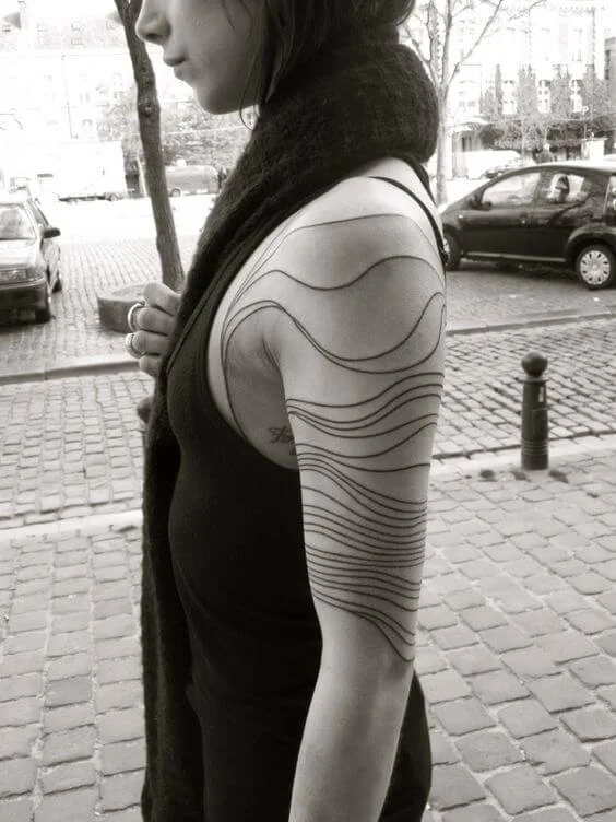 Shoulder and Arms Lomg Lines Tattoo