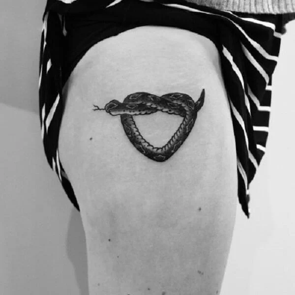 Tiny Hearted Snake Tattoo on Thigh