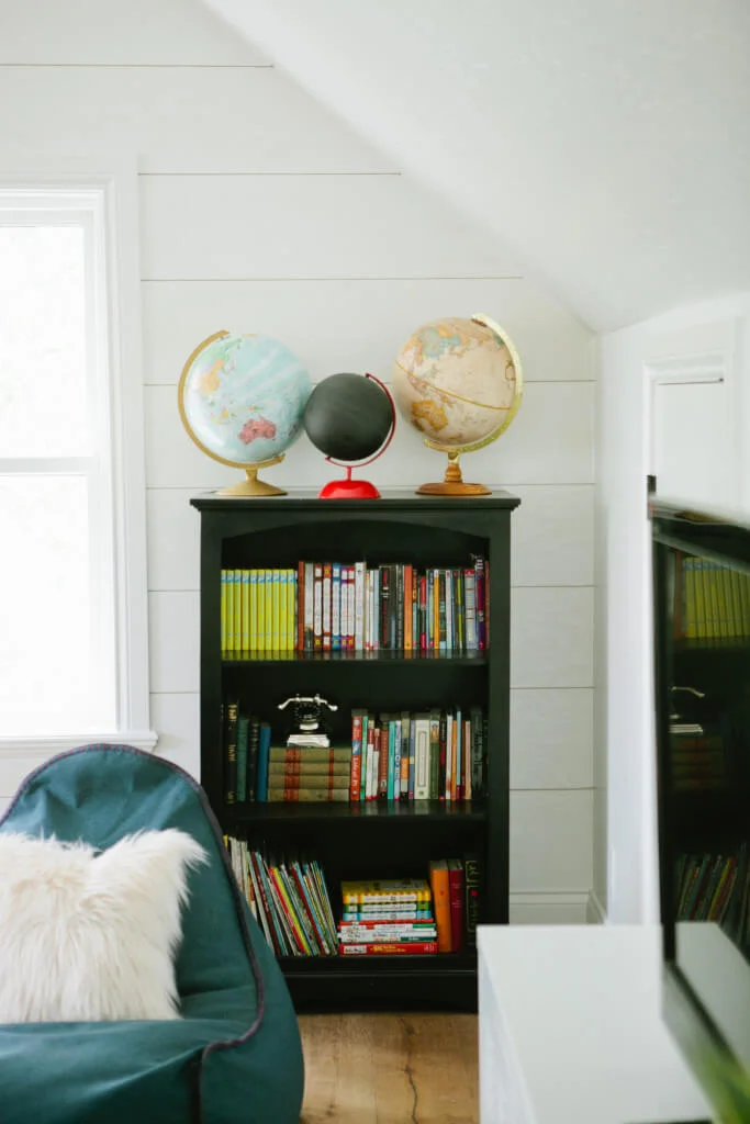 bookshelf and globes