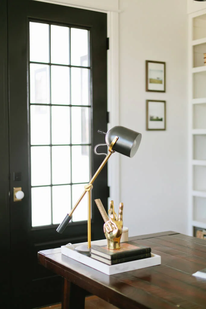 brass peace sign and kenneth lamp