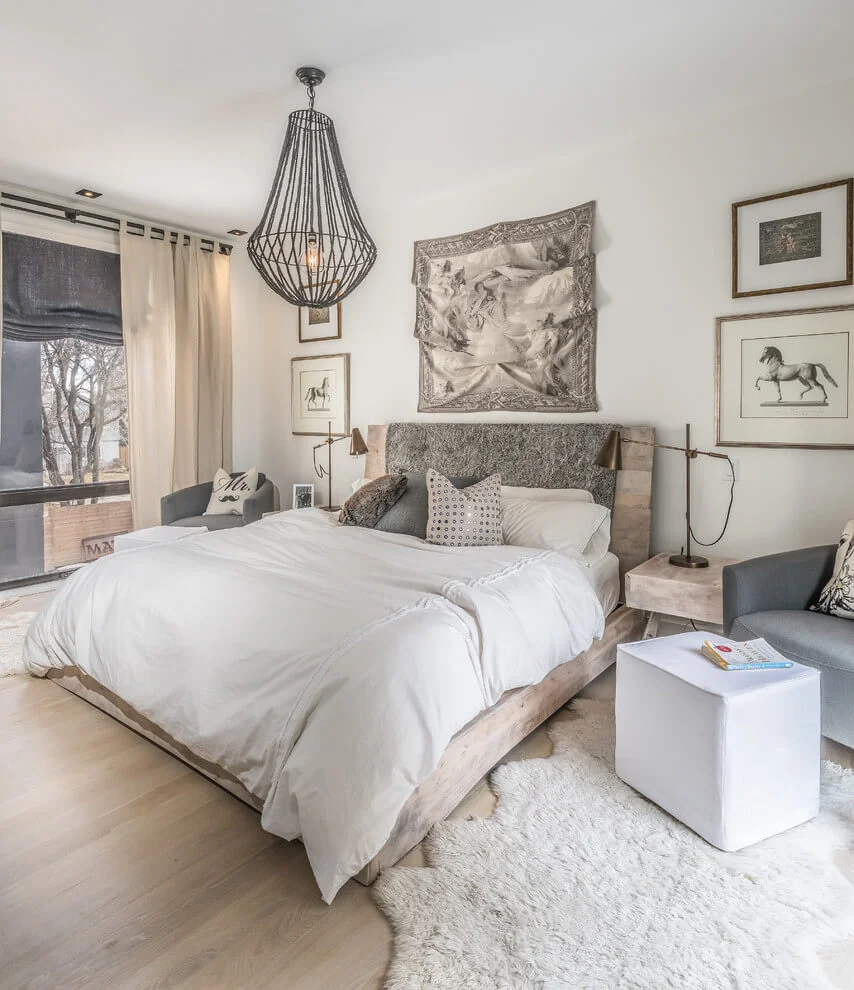 chandelier over comfy low bed
