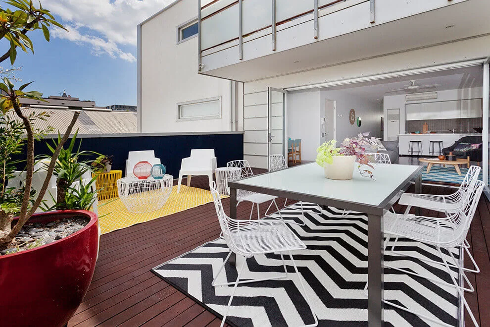 colorful rugs outdoor dining