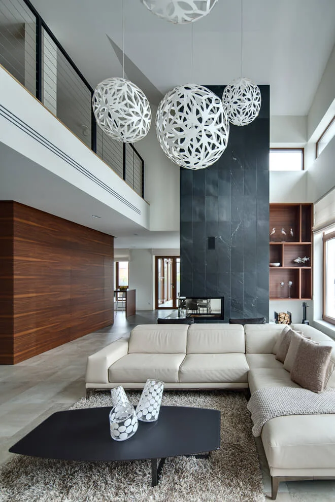 black accent wall white pendant lights