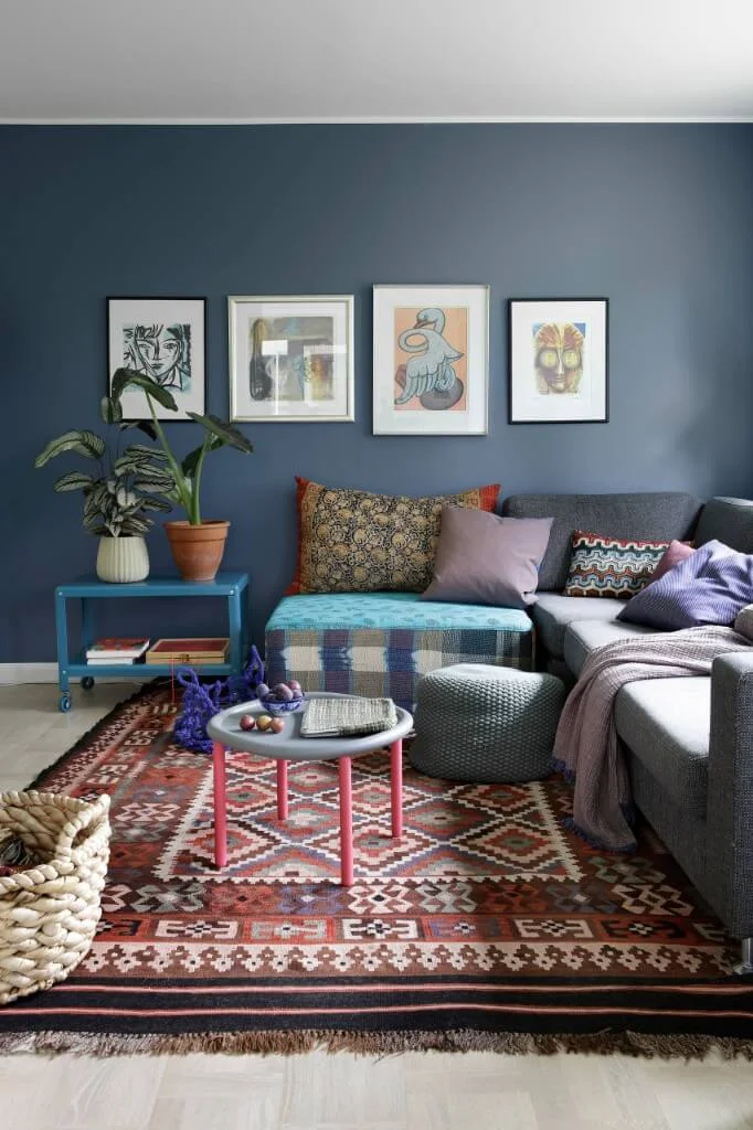 patterned rug and grey sofa