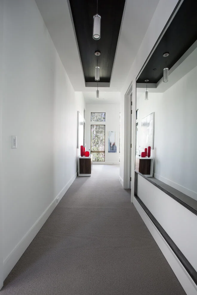 white and wood hallway design