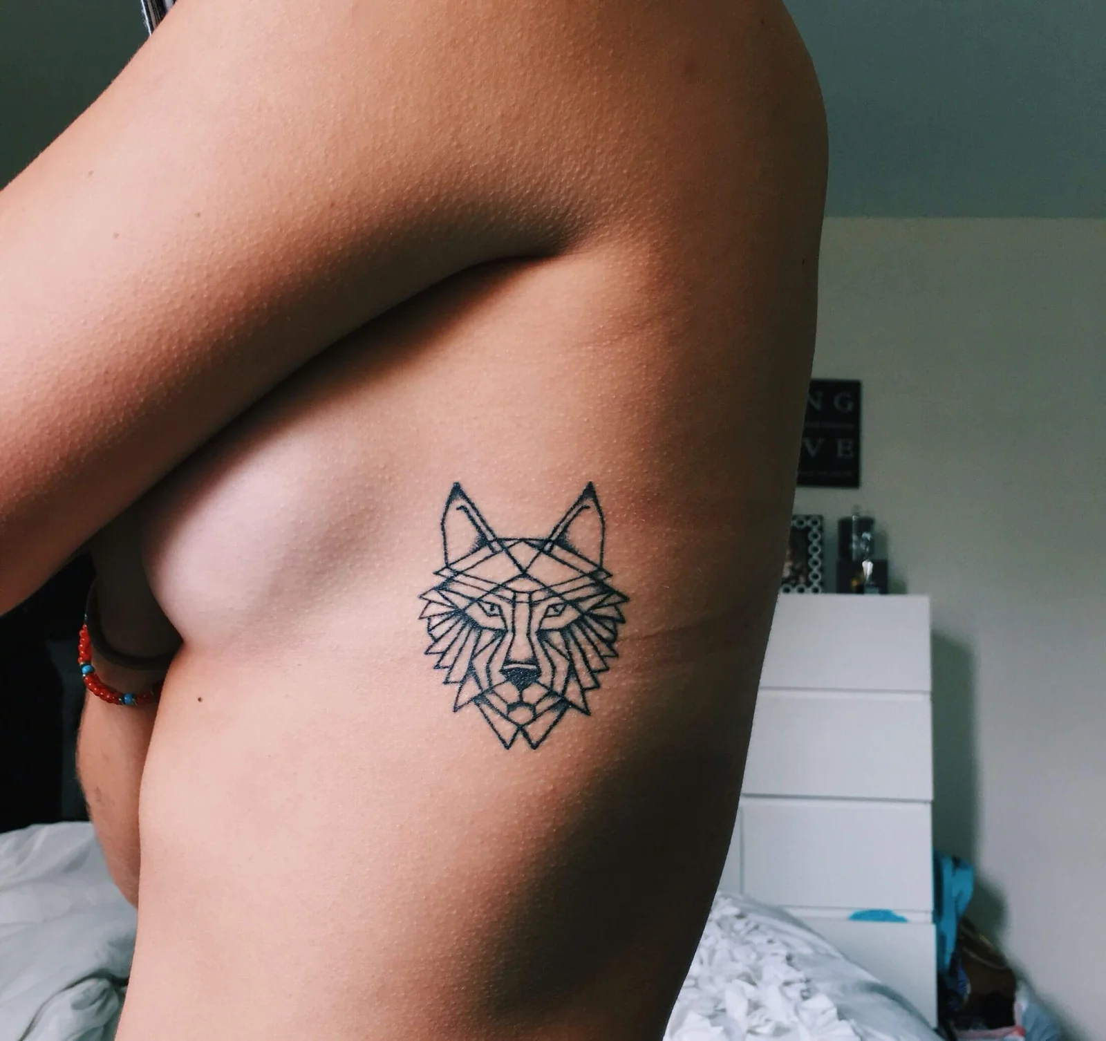 Small Wolf Tattoo