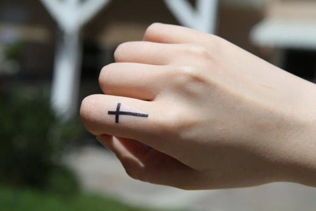 Cross Tattoo On Finger