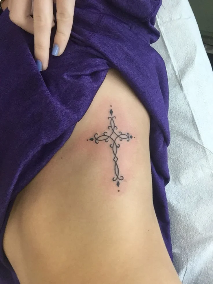 Ribs Cross Tattoo