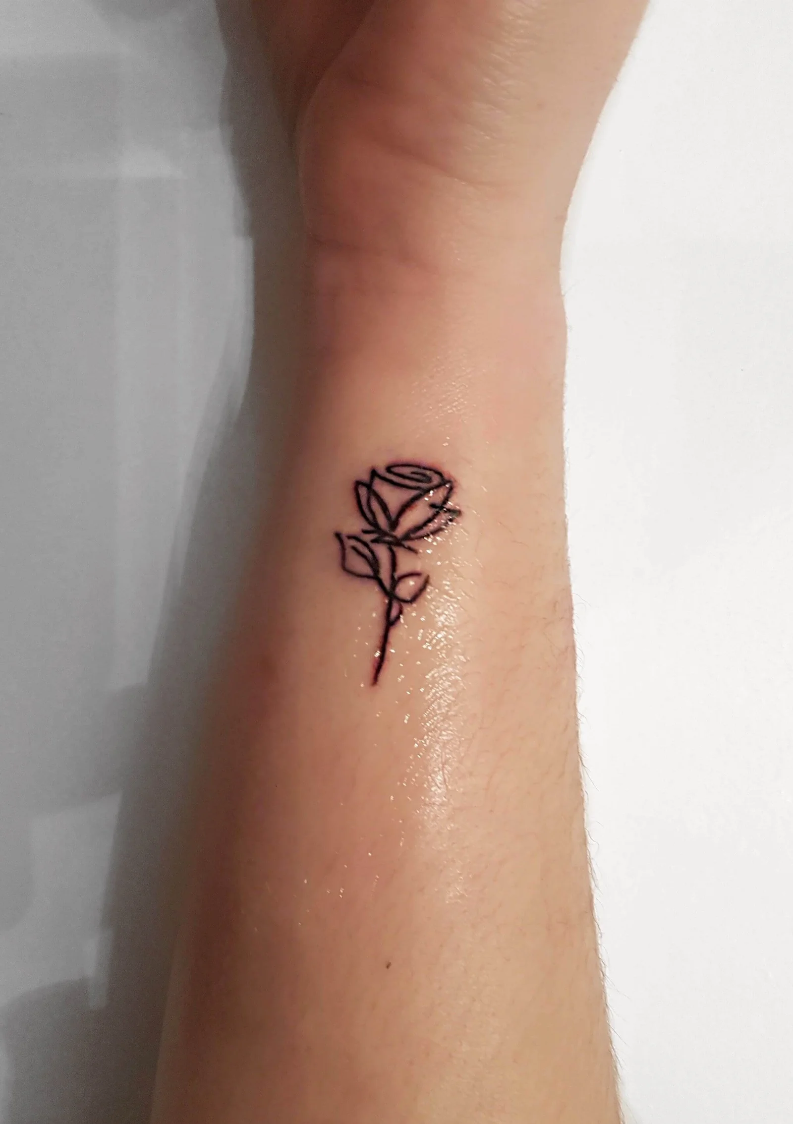 Tiny Rose Tattoo