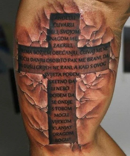 Bicep Cross Tattoo