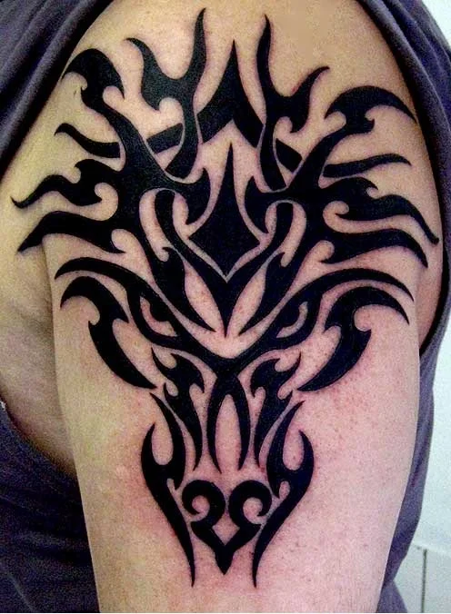 Tribal Dragon Tattoo