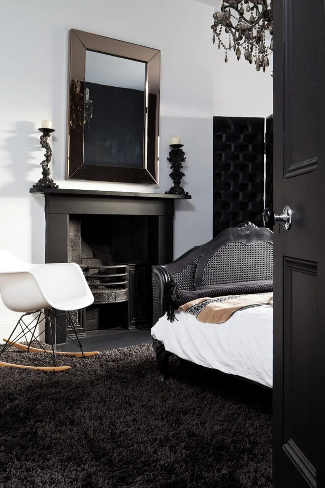 Dark Floors And Accents In White Bedroom