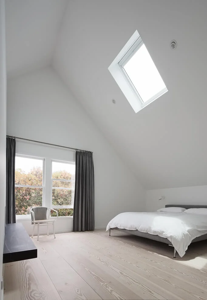 High Ceiling Bedroom With Fireplace