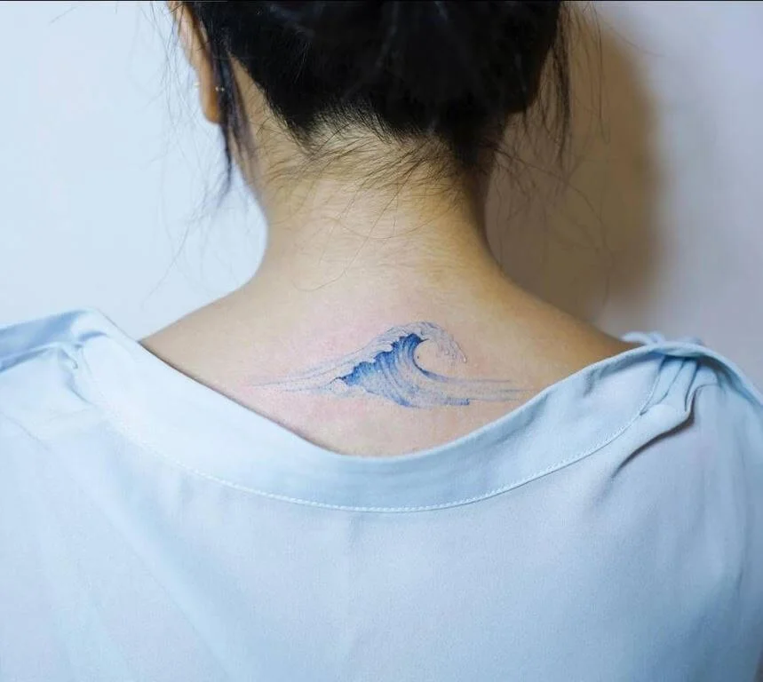 Colorful Upper Back Waves Tattoo