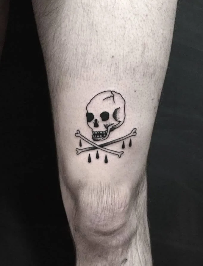 Upper Leg Skull and Crossbones Ink