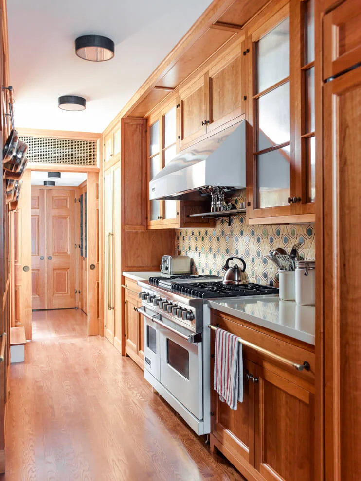 Galley Kitchen In Wood Tones